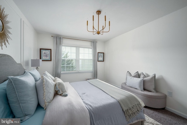 47 Christopher Way, Stafford, VA 22554 - carpeted bedroom featuring a chandelier and baseboards