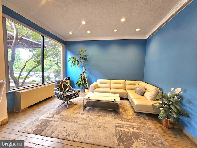 5340 Holmes Run Pkwy Unit 1410, Alexandria, VA 22304 - living room with ornamental molding, healthy amount of natural light, a textured ceiling, baseboards, and recessed lighting