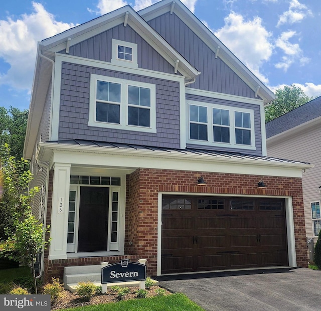 126 Sadie Way, Arnold, MD 21012 - craftsman-style home featuring board and batten siding, a standing seam roof, metal roof, a garage, and aphalt driveway