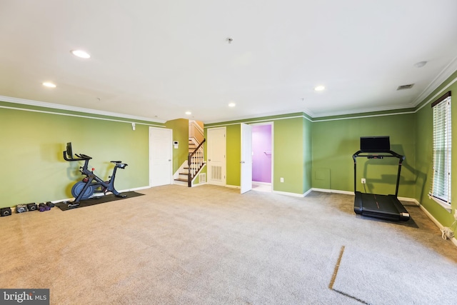 workout room featuring recessed lighting, baseboards, and crown molding