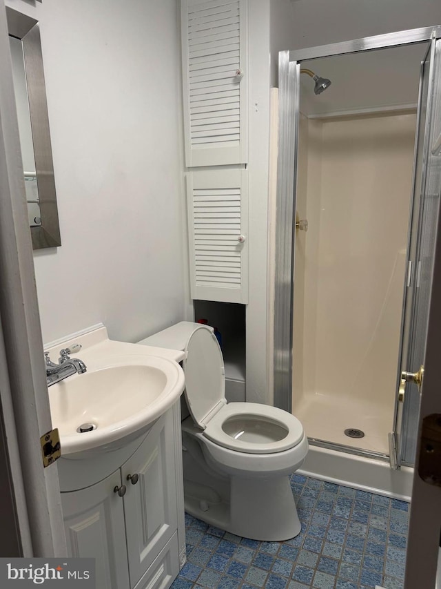 10020 Dakin Ct, Cheltenham, MD 20623 - bathroom with a stall shower, vanity, toilet, and tile patterned flooring