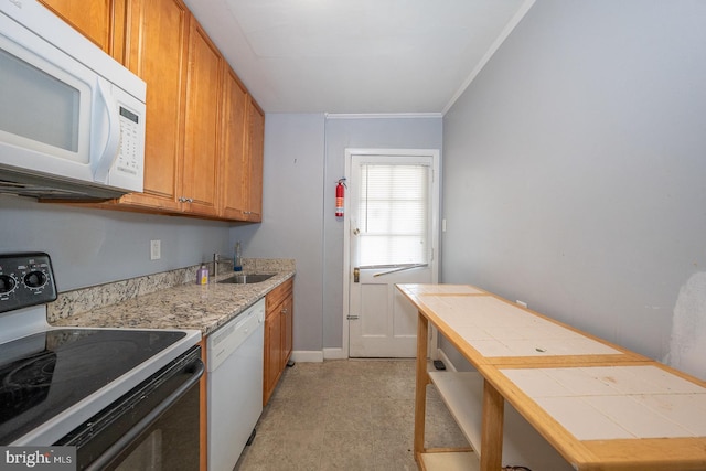 1405 Siegel Ave, Chester, PA 19013 - kitchen with a sink, tile counters, brown cabinetry, crown molding, and white appliances