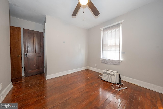 1405 Siegel Ave, Chester, PA 19013 - empty room featuring wood-type flooring, ceiling fan, a wall unit AC, and baseboards