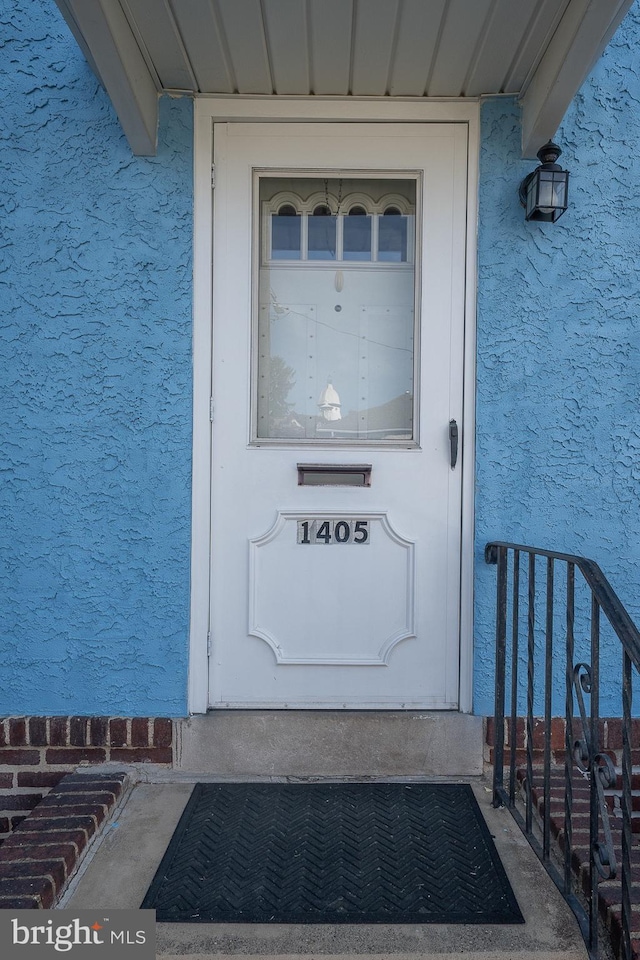 1405 Siegel Ave, Chester, PA 19013 - entrance to property featuring stucco siding
