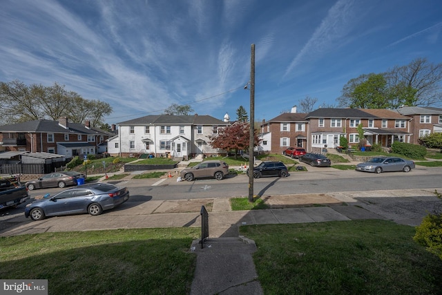 1405 Siegel Ave, Chester, PA 19013 - view of street with sidewalks, a residential view, and street lights