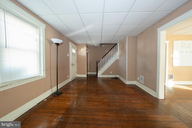 1405 Siegel Ave, Chester, PA 19013 - interior space featuring a paneled ceiling, hardwood / wood-style flooring, baseboards, and stairs