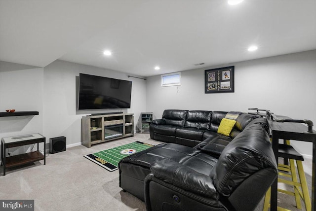 living area with recessed lighting, baseboards, and carpet floors