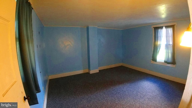 8354 Cumberland Rd, Springfield, WV 26763 - spare room featuring baseboards, crown molding, and carpet