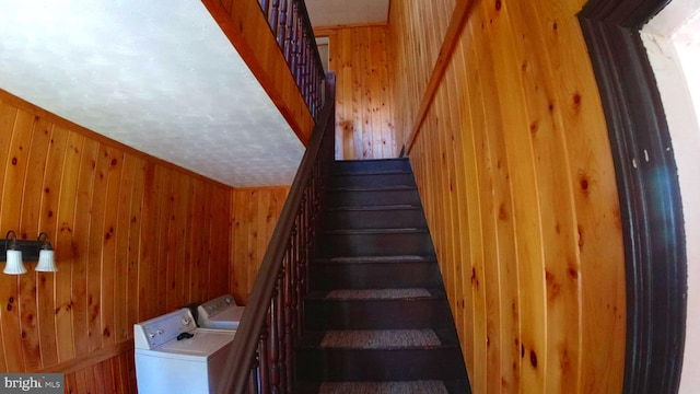 8354 Cumberland Rd, Springfield, WV 26763 - stairway featuring independent washer and dryer and wood walls