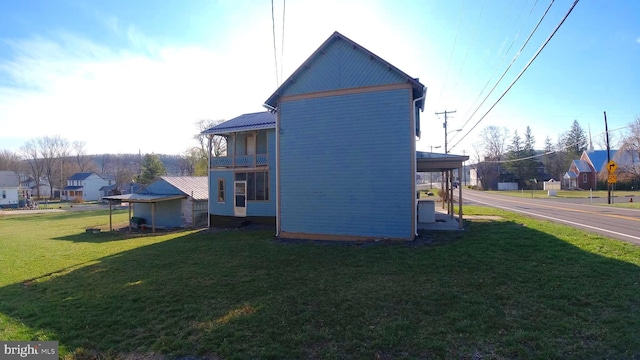 8354 Cumberland Rd, Springfield, WV 26763 - view of side of property with a lawn