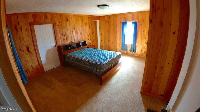 8354 Cumberland Rd, Springfield, WV 26763 - carpeted bedroom with a textured ceiling and wooden walls