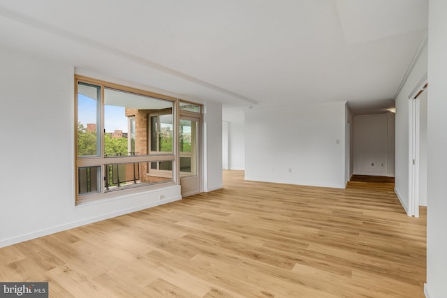 4101 Cathedral Ave NW Unit 1104, Washington, DC 20016 - empty room featuring light wood-style flooring and baseboards