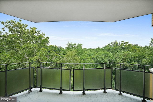 4101 Cathedral Ave NW Unit 1104, Washington, DC 20016 - balcony featuring a wooded view