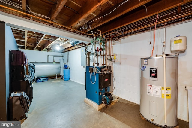 unfinished basement with heating fuel, electric panel, water heater, and a heating unit