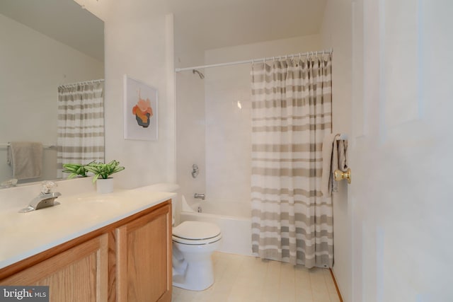 bathroom with vanity, toilet, and shower / bath combo with shower curtain