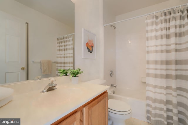 bathroom with vanity, toilet, and shower / bath combo with shower curtain