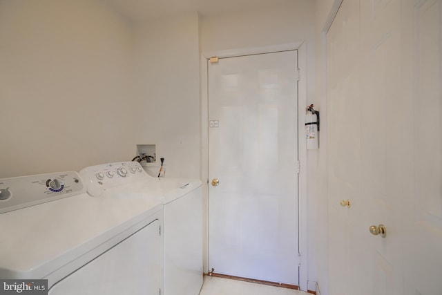 laundry room featuring laundry area and washer and clothes dryer