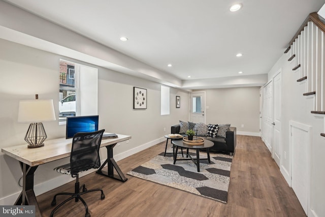 office area featuring wood finished floors, baseboards, and recessed lighting
