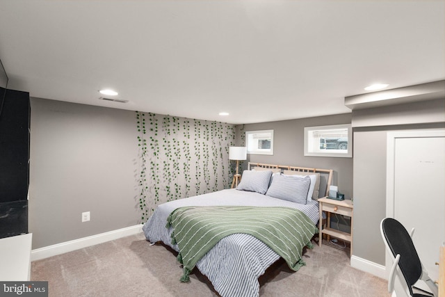 bedroom featuring visible vents, carpet floors, and recessed lighting