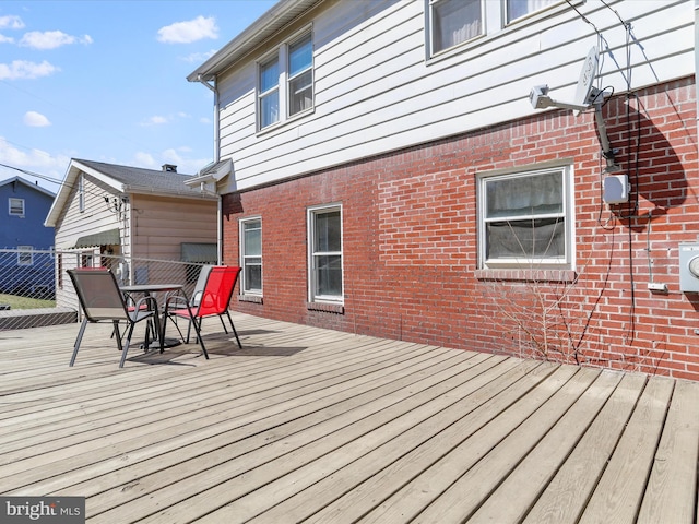 433 Williams St, Cumberland, MD 21502 - wooden terrace featuring outdoor dining area and fence