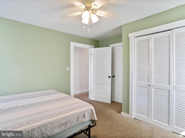 433 Williams St, Cumberland, MD 21502 - bedroom featuring light carpet, baseboards, a closet, and a ceiling fan