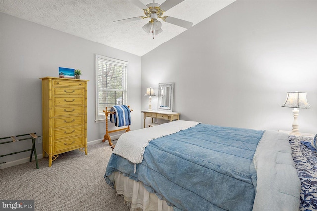 9 Edgewood Dr, Ocean Pines, MD 21811 - bedroom featuring a ceiling fan, a textured ceiling, baseboards, lofted ceiling, and light carpet