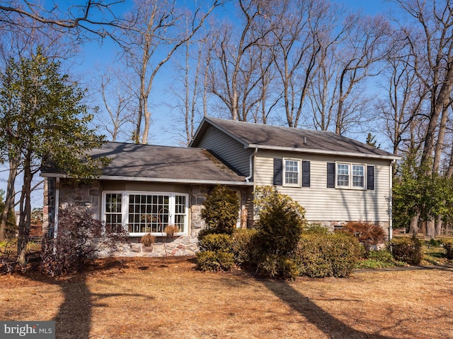 view of home's exterior featuring stone siding
