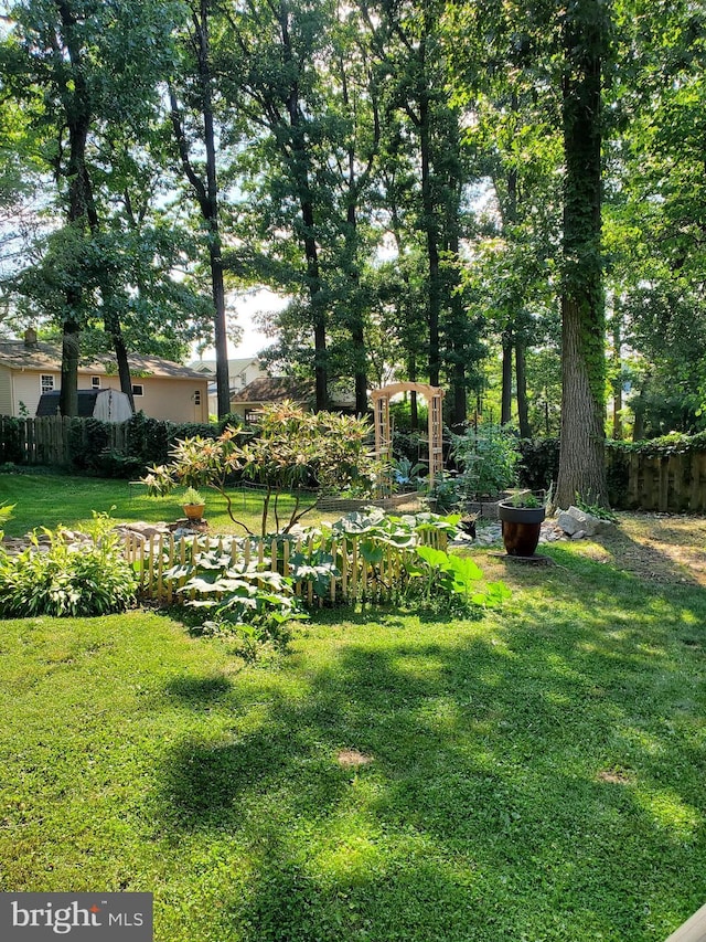 view of yard featuring fence