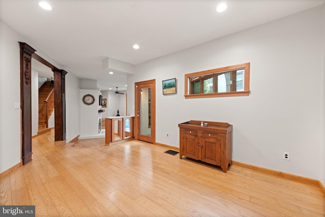 4544 30th St NW, Washington, DC 20008 - unfurnished room featuring baseboards, stairs, light wood finished floors, and recessed lighting