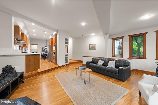 4544 30th St NW, Washington, DC 20008 - living area with baseboards, recessed lighting, and light wood-type flooring