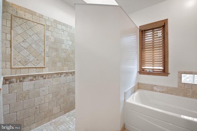 4544 30th St NW, Washington, DC 20008 - full bathroom with walk in shower, tile walls, and a garden tub