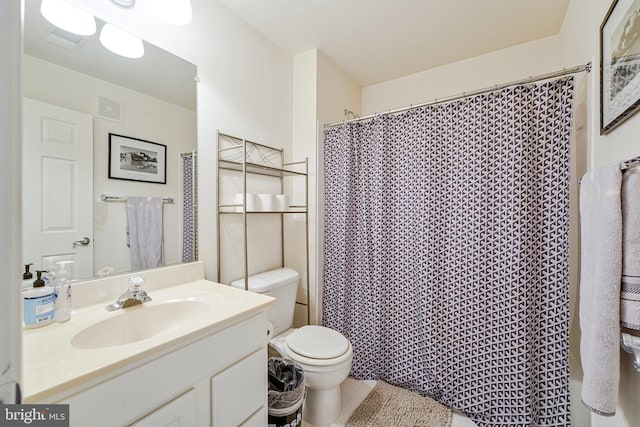 11575 Cavalier Landing Ct Unit 402, Fairfax, VA 22030 - full bathroom featuring tile patterned floors, vanity, visible vents, and toilet