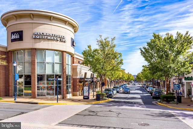 11575 Cavalier Landing Ct Unit 402, Fairfax, VA 22030 - view of road with sidewalks, street lights, and curbs