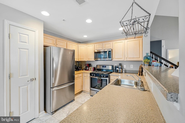 11575 Cavalier Landing Ct Unit 402, Fairfax, VA 22030 - kitchen with light brown cabinets, an inviting chandelier, recessed lighting, stainless steel appliances, and a sink