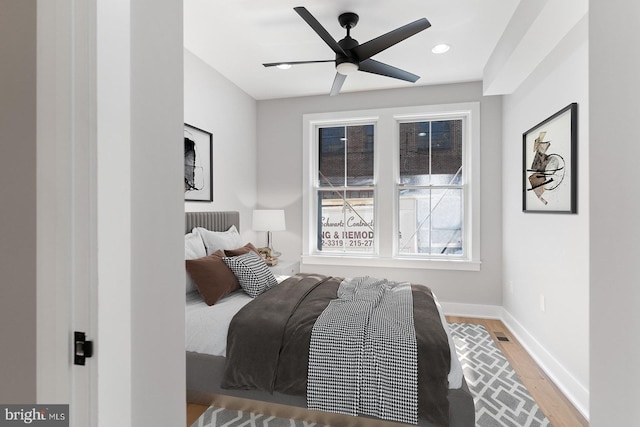 1812 E Moyamensing Ave, Philadelphia, PA 19148 - bedroom with wood finished floors, baseboards, recessed lighting, and a ceiling fan