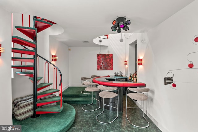 910 Pennwood Cir, Lancaster, PA 17601 - dining area with baseboards, stairway, and bar