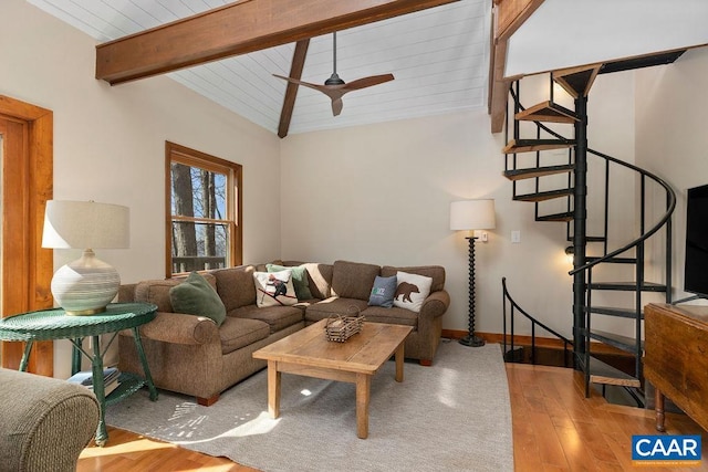 145 Firtree Dr, Wintergreen Resort, VA 22967 - living area featuring a ceiling fan, baseboards, lofted ceiling with beams, light wood-style flooring, and stairs