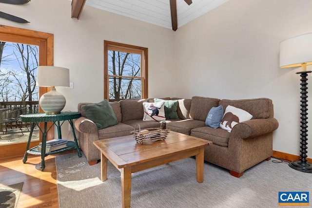 145 Firtree Dr, Wintergreen Resort, VA 22967 - living room featuring plenty of natural light, vaulted ceiling with beams, ceiling fan, and wood finished floors
