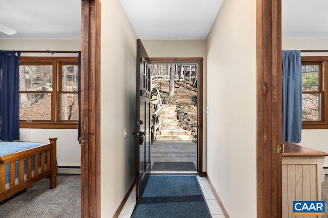 145 Firtree Dr, Wintergreen Resort, VA 22967 - doorway to outside featuring baseboards and a baseboard radiator