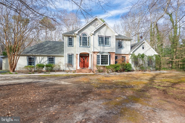 view of front of property with brick siding