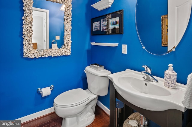 8725 Warm Waves Way Unit 10, Columbia, MD 21045 - bathroom with toilet, wood finished floors, and baseboards
