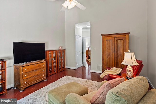 8725 Warm Waves Way Unit 10, Columbia, MD 21045 - living room with a towering ceiling, a ceiling fan, baseboards, wood finished floors, and ornamental molding