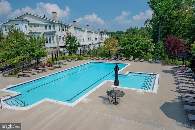 8725 Warm Waves Way Unit 10, Columbia, MD 21045 - community pool featuring a patio