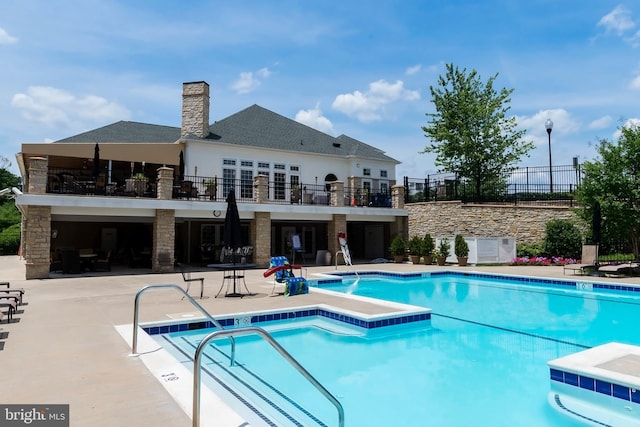 8725 Warm Waves Way Unit 10, Columbia, MD 21045 - community pool featuring a patio