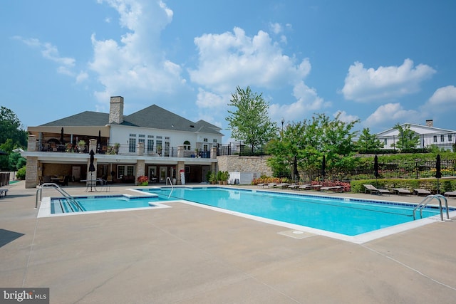 8725 Warm Waves Way Unit 10, Columbia, MD 21045 - community pool featuring a patio area