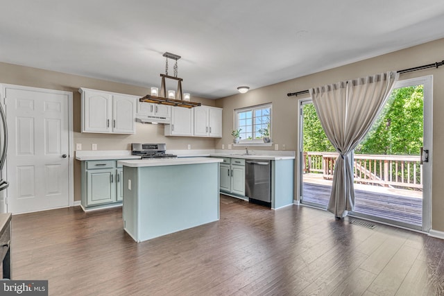 4735 Queens Grove St, White Plains, MD 20695 - kitchen with under cabinet range hood, dark wood-style flooring, appliances with stainless steel finishes, and light countertops