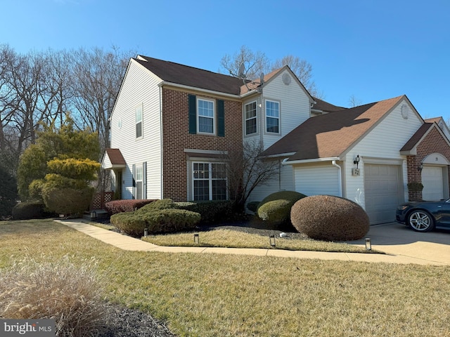 22 Chilmark Ct, Bear, DE 19701 - traditional-style home with brick siding, driveway, a front lawn, and a garage