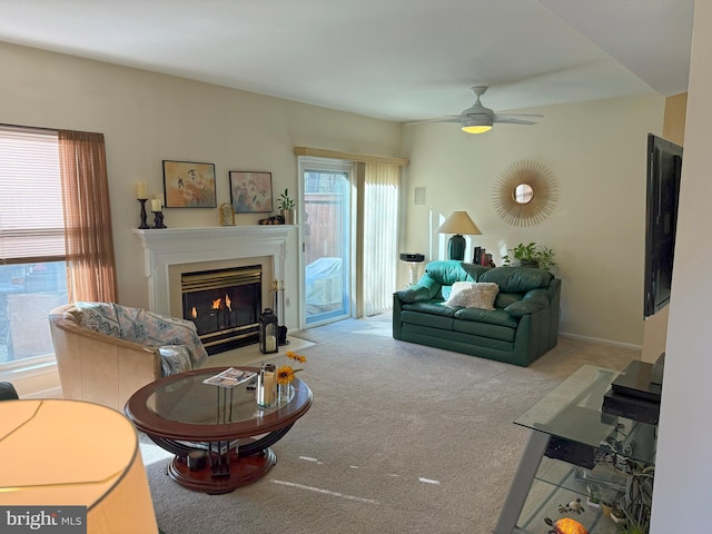 22 Chilmark Ct, Bear, DE 19701 - carpeted living room with a fireplace with flush hearth, a ceiling fan, and a wealth of natural light