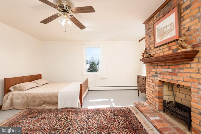 100 Wall St, Queenstown, MD 21658 - bedroom featuring a fireplace and a baseboard heating unit