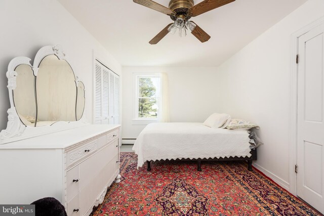 100 Wall St, Queenstown, MD 21658 - carpeted bedroom featuring baseboards, ceiling fan, and a baseboard heating unit